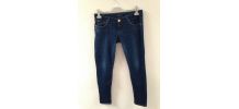 Jeans noeuds aux poches des fesses.