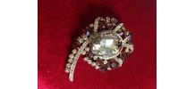 Broche  baroque virgule