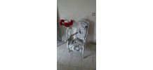 Fauteuil Voltaire tissu journaux 