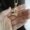 Collier papillon en plaque or neuf
