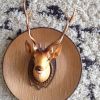 Tête de cerf en plastique 