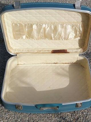 Valise bleue vintage