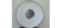 plat rond représentant deux perdrix
