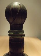 ancienne bouteille à cognac recouverte de cuir