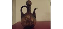ancienne bouteille couverte cuir et peinte