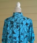 Chemisier vintage 80ies T36 à 44 turquoise motifs géométriques noirs