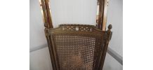 Fauteuil de bureau, dossier cannelé style Louis XVI.