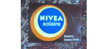 plaque publicitaire en métal