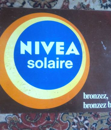 plaque publicitaire en métal