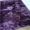 Très beau tapis violet