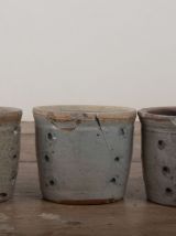 Lot de 3 anciennes faisselles en terre émaillée.