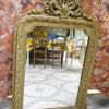 Miroir ancien empire en bois et stuc doré