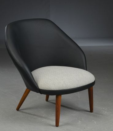 Fauteuil en cuir noir et laine