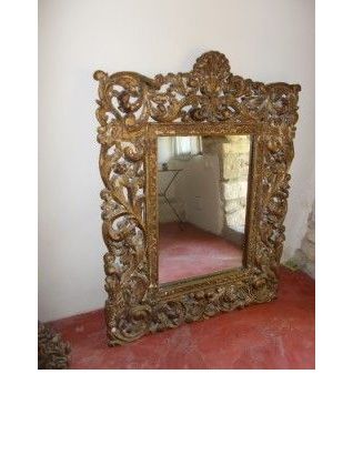 Miroir sculpté doré ancien