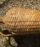 Dame jeanne en robe d'osier avec anse,  vintage