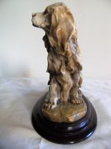 Statuette chien épagneul breton cocker en biscuit