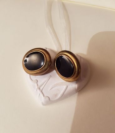 Boucles d'oreilles a clips noires et dorées