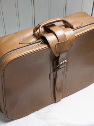 valise de voyage en cuir camel vintage