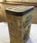 Boîte en métal cacao Lombard à sujets en relief 