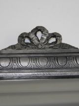 Miroir ancien en bois sculpté, patiné noir et argent