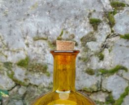 fiole jaune en verre/vase à fleurs