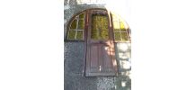 Porte d'entrée en chêne bâti cintré année 1930
