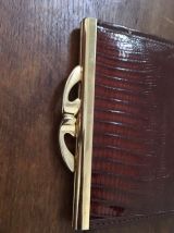 Ancien porte monnaie à soufflets en cuir marron façon croco.