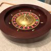 Roulette en acajou et son tapis