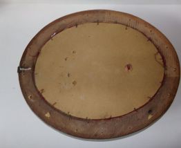 Médaillon en bois sculpté 