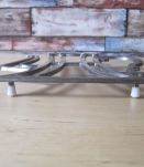 dessous de plat forme de théière en metal vintage   