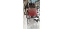 ancienne pompe a filtrer le vin