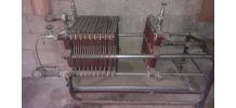 ancienne pompe a filtrer le vin