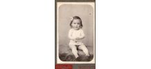 photo ancienne enfant avec nœud dans les cheveux vers 1900