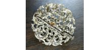 Ancienne broche en métal argenté, brillant