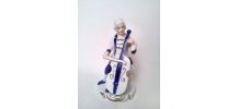 statuette figurine de porcelaine musicien