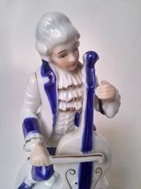 statuette figurine de porcelaine musicien