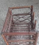 Porte bouteilles vintage en rotin