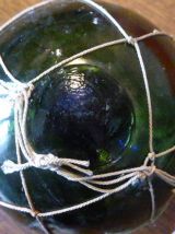 Deux boules en verre soufflée verte, flotteurs de peche 