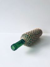 Bouteille décorative avec osier