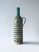 Bouteille décorative avec osier
