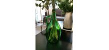 Ancienne bouteille en forme d'olive verte