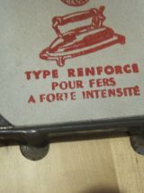 ancien porte fer a repasser en métal léger 
