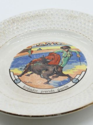 Assiette en faience toréador prend garde 