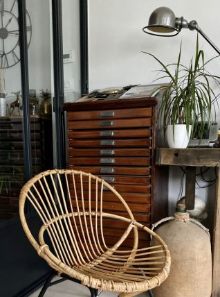 Fauteuil rotin pieds métal vintage