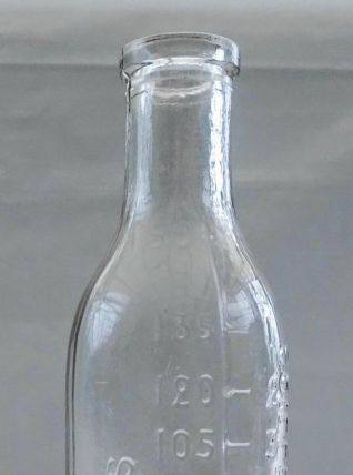 Bouteille de pharmacie ancienne graduée
