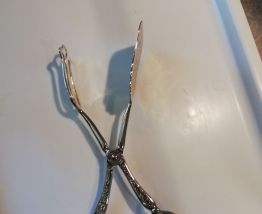 Pince métal argenté vintage