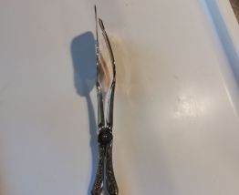 Pince métal argenté vintage