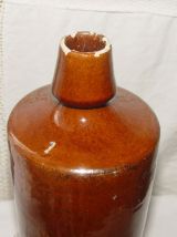  Ancienne bouteille ronde en grès vernissé brun