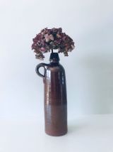 Bouteille antique avec anse
