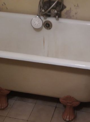 Baignoire en fonte sur pieds